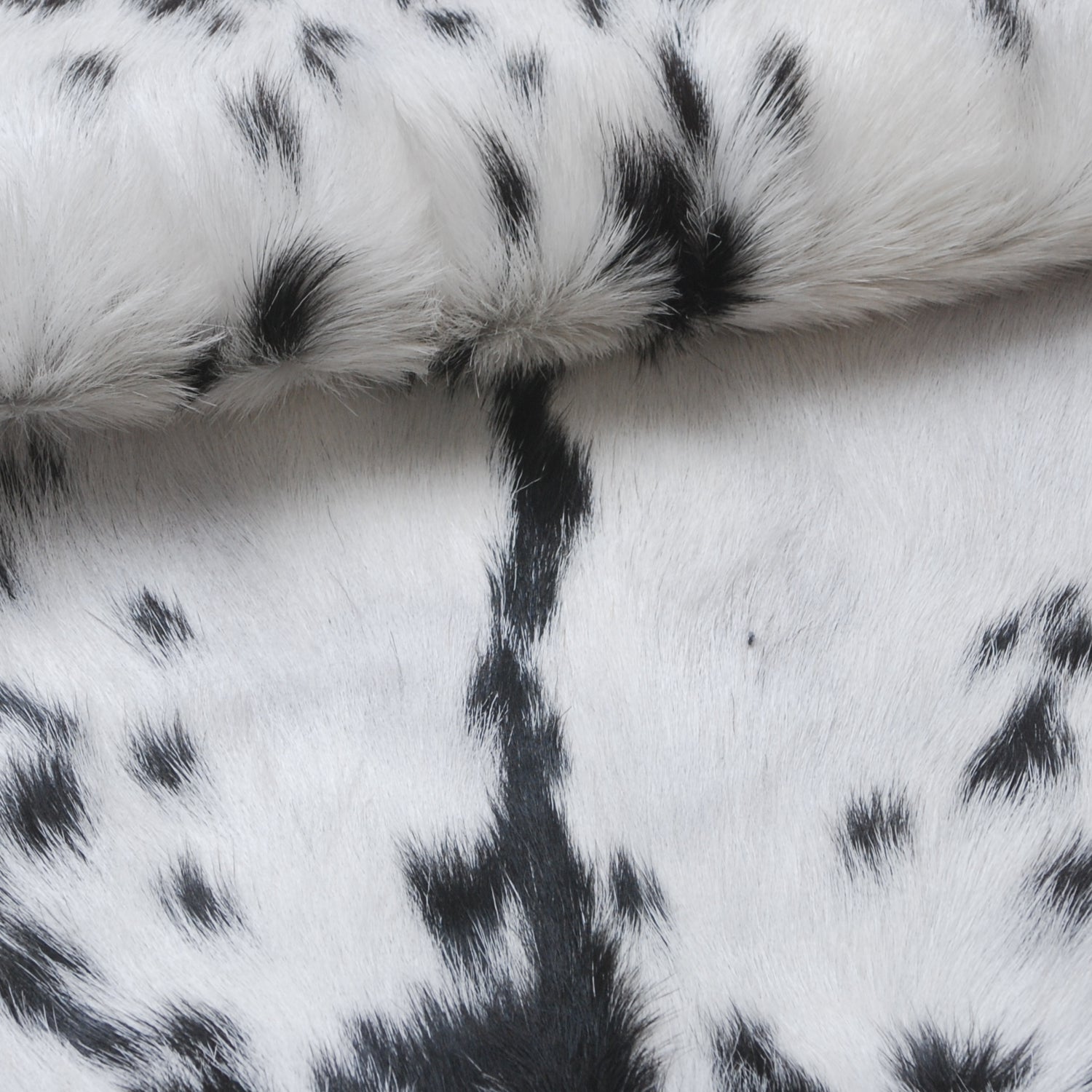 Authentic Black and White Goat Skin Rug - Perfect for Modern and Classic Décor