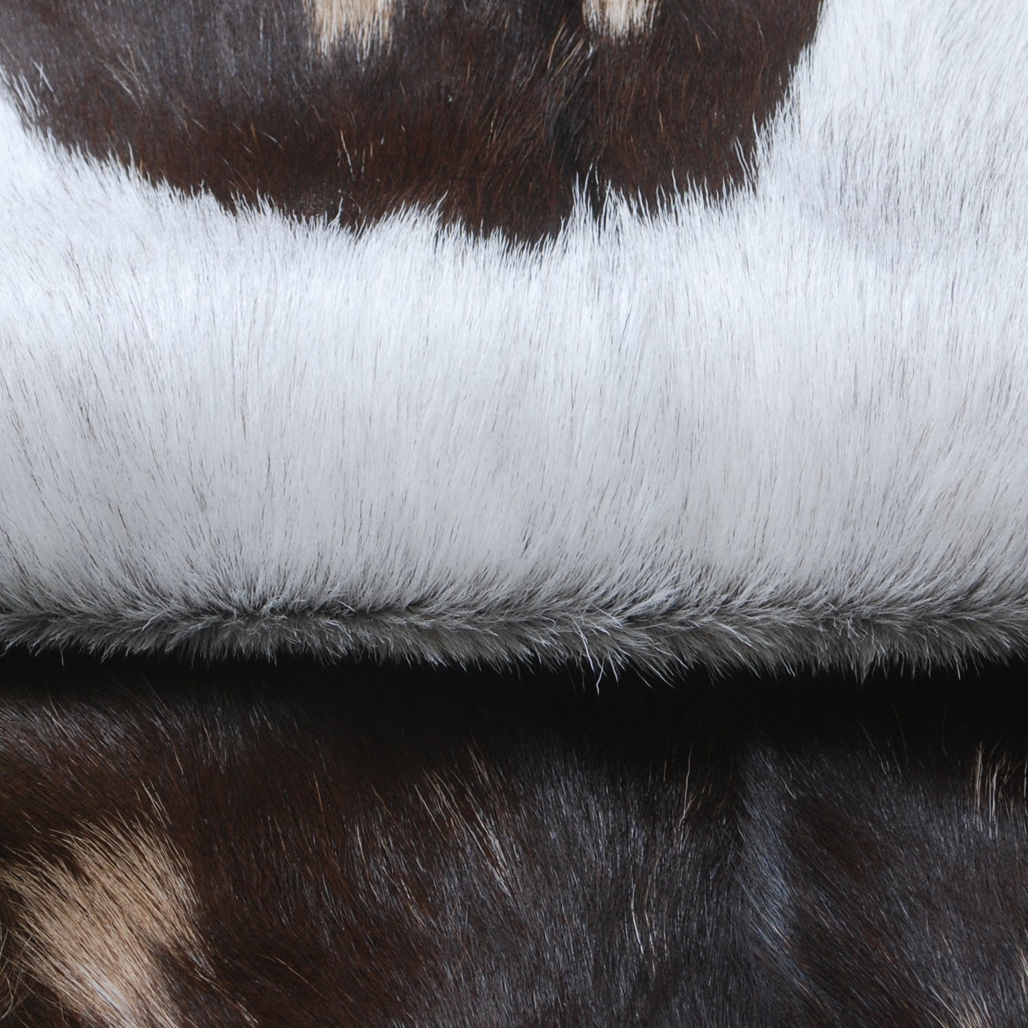 Decorative Brown and White Goat Hide Rug - Perfect for Floor or Wall Accents