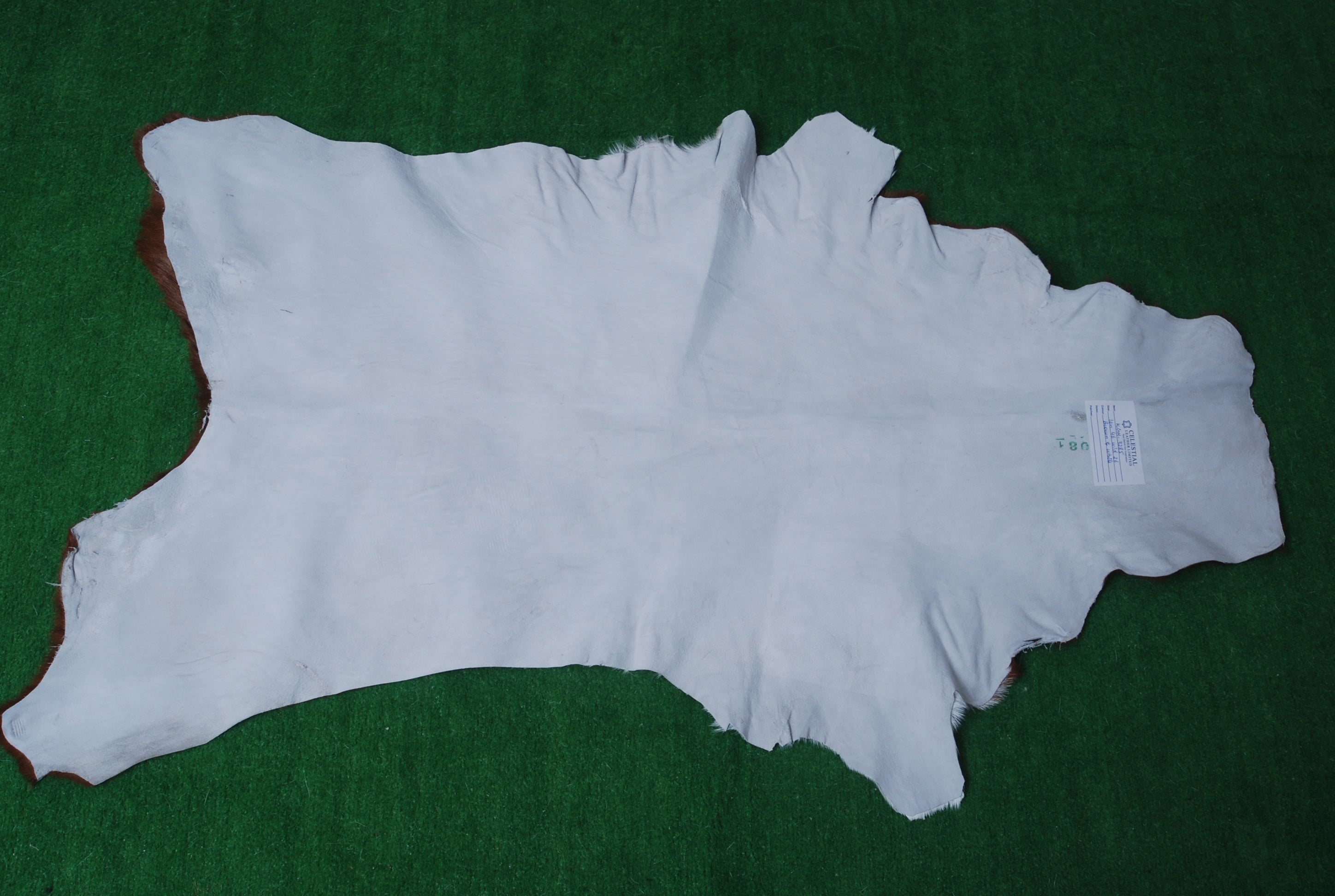 Handcrafted Dark Brown Goat Skin Rug - Genuine Leather for Luxurious Décor - Celestial Leather Limited