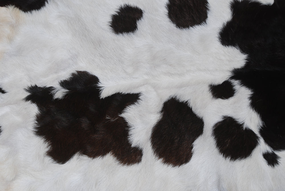Rustic Black and White Goat Hide Rug - Perfect for Floor or Wall Décor - Celestial Leather Limited