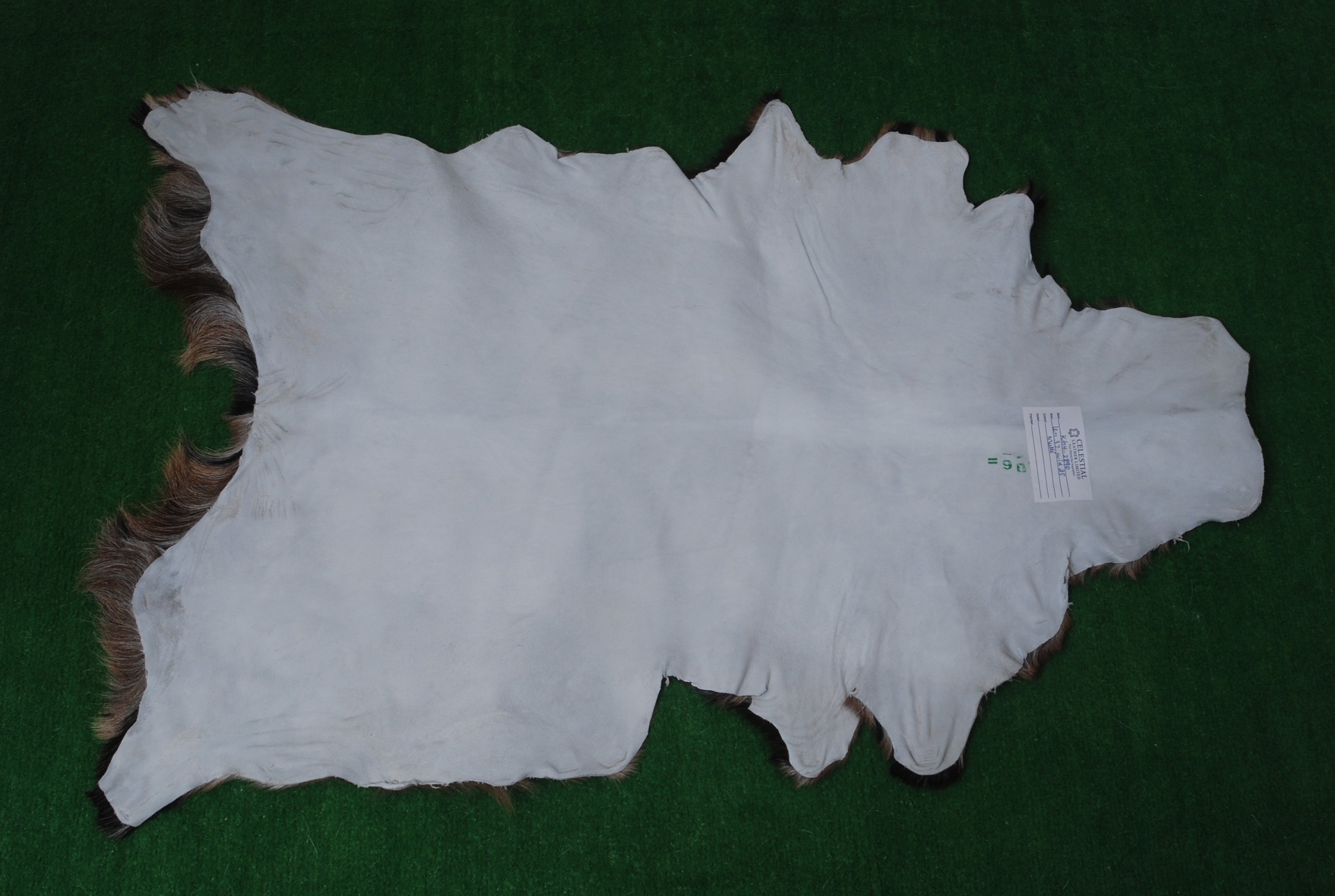 Black and Brown Handmade Goat Skin Rug – Rustic Charm for Your Home