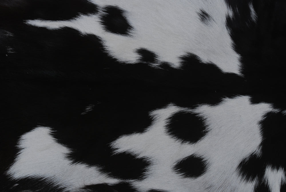 Natural Black and White Goat Hide Rug - Luxurious and Stylish Floor Accent - Celestial Leather Limited