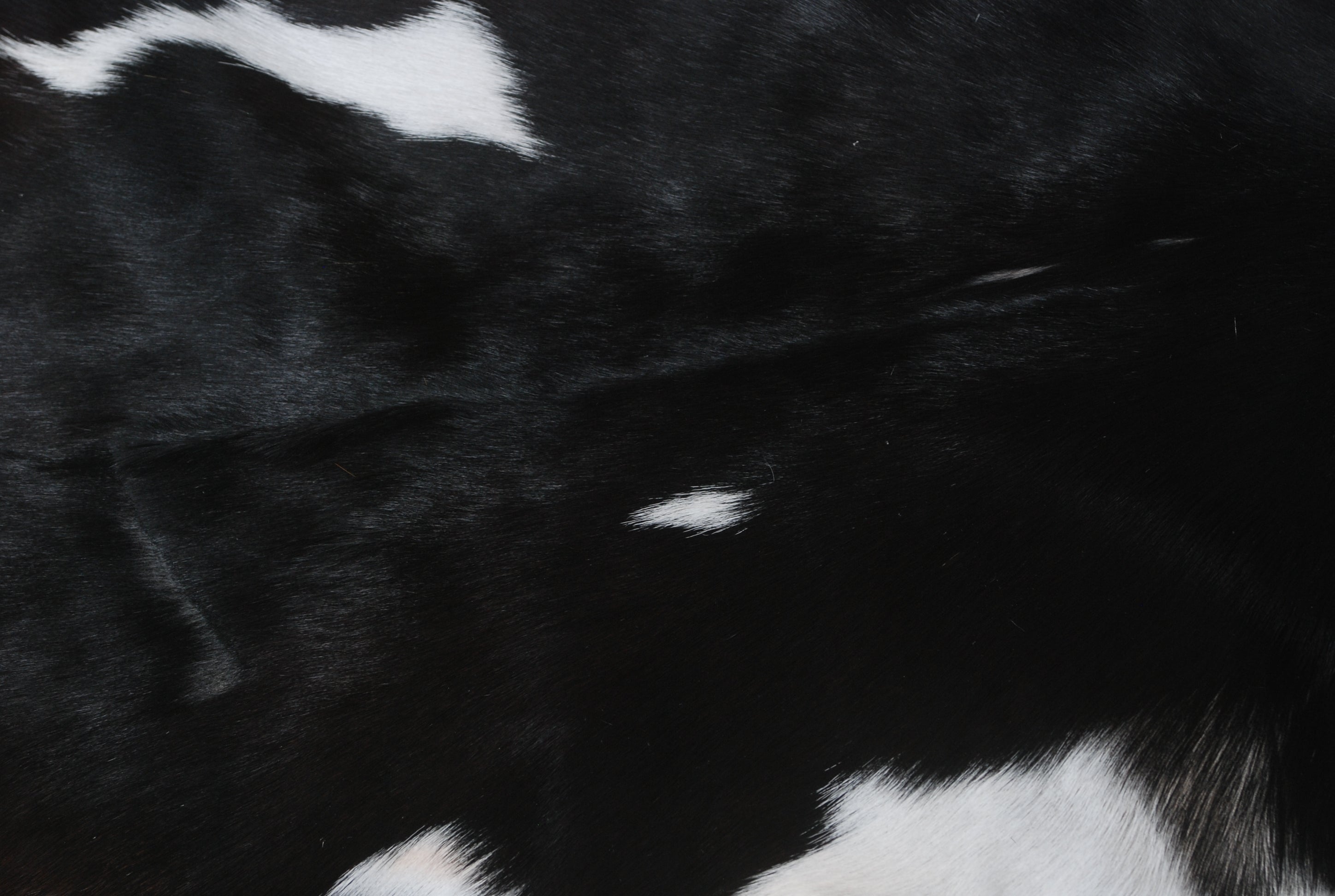 Luxurious Black & White Goat Skin Rug - Floor Décor for Home Décor - Celestial Leather Limited