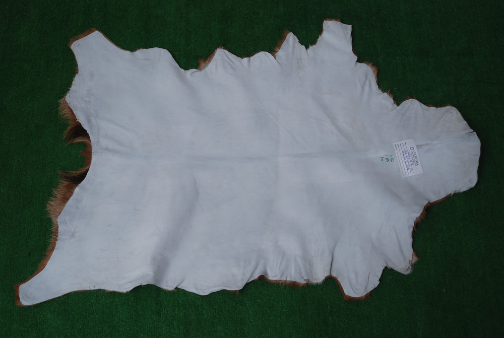 Luxurious Brown and Black Genuine Goat Hide Rug - Premium Hair-On Goat Skin Rug - Celestial Leather Limited