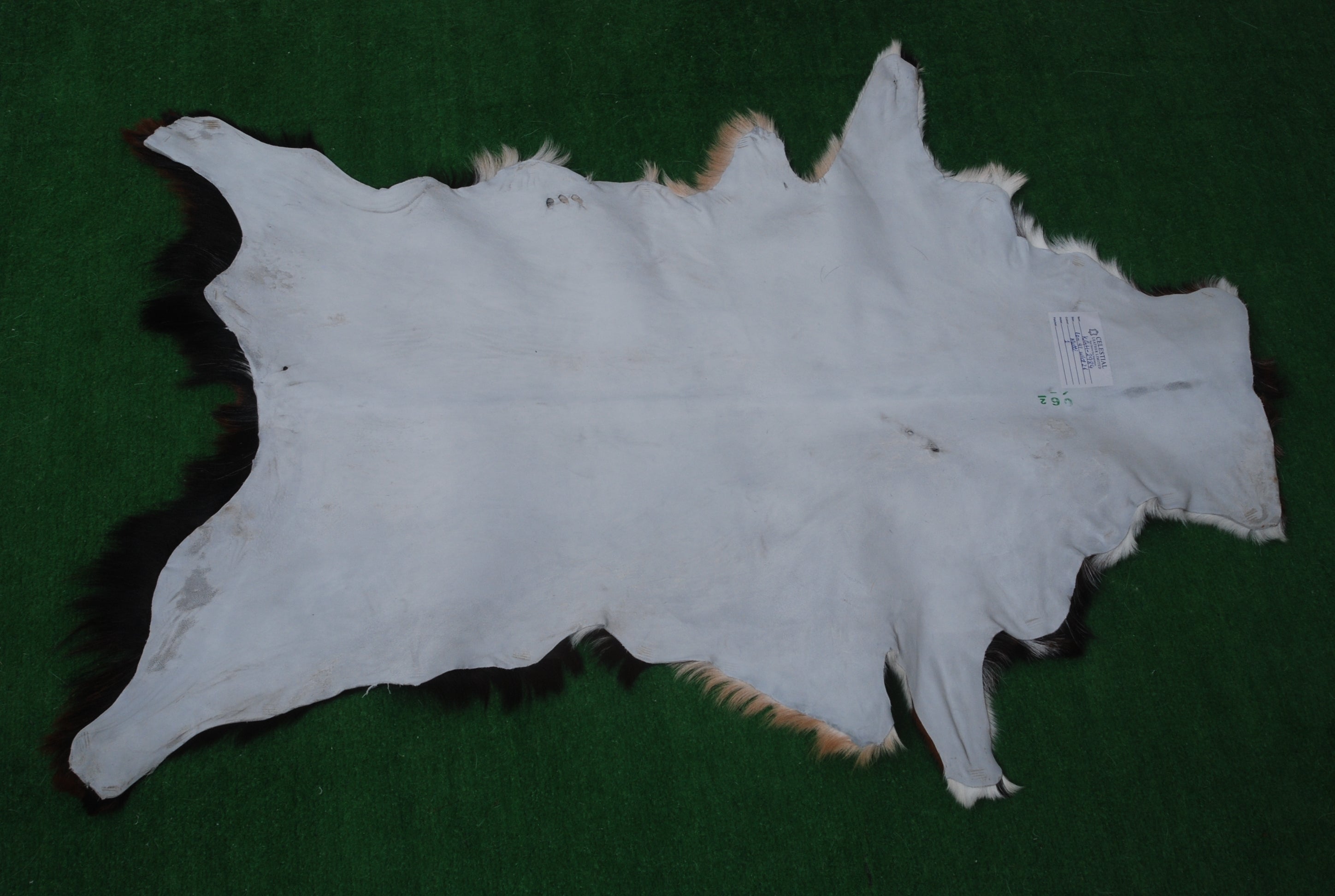 Handcrafted Dark Brown Goat Hide Rug - Soft, Natural Leather for Home Décor