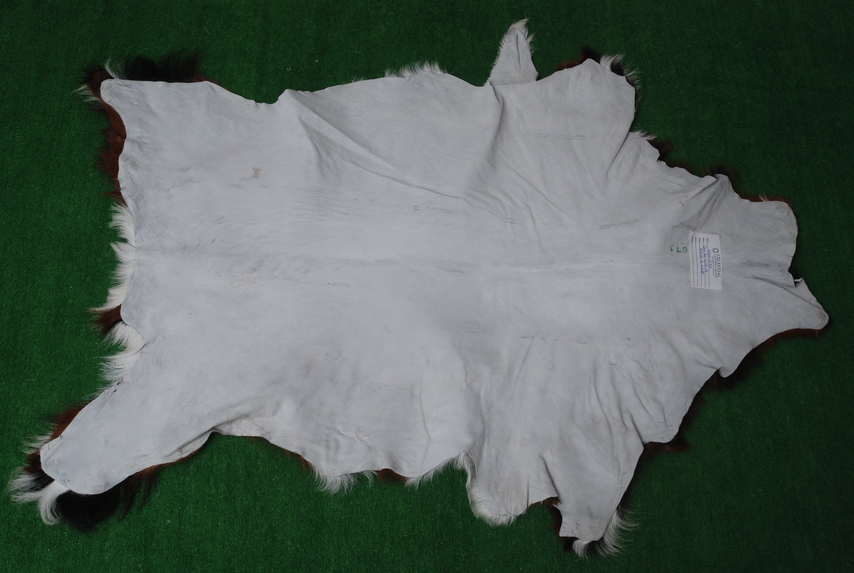 Handcrafted Black and White Goat Skin Rug - Soft and Durable Hair-On Leather - Celestial Leather Limited