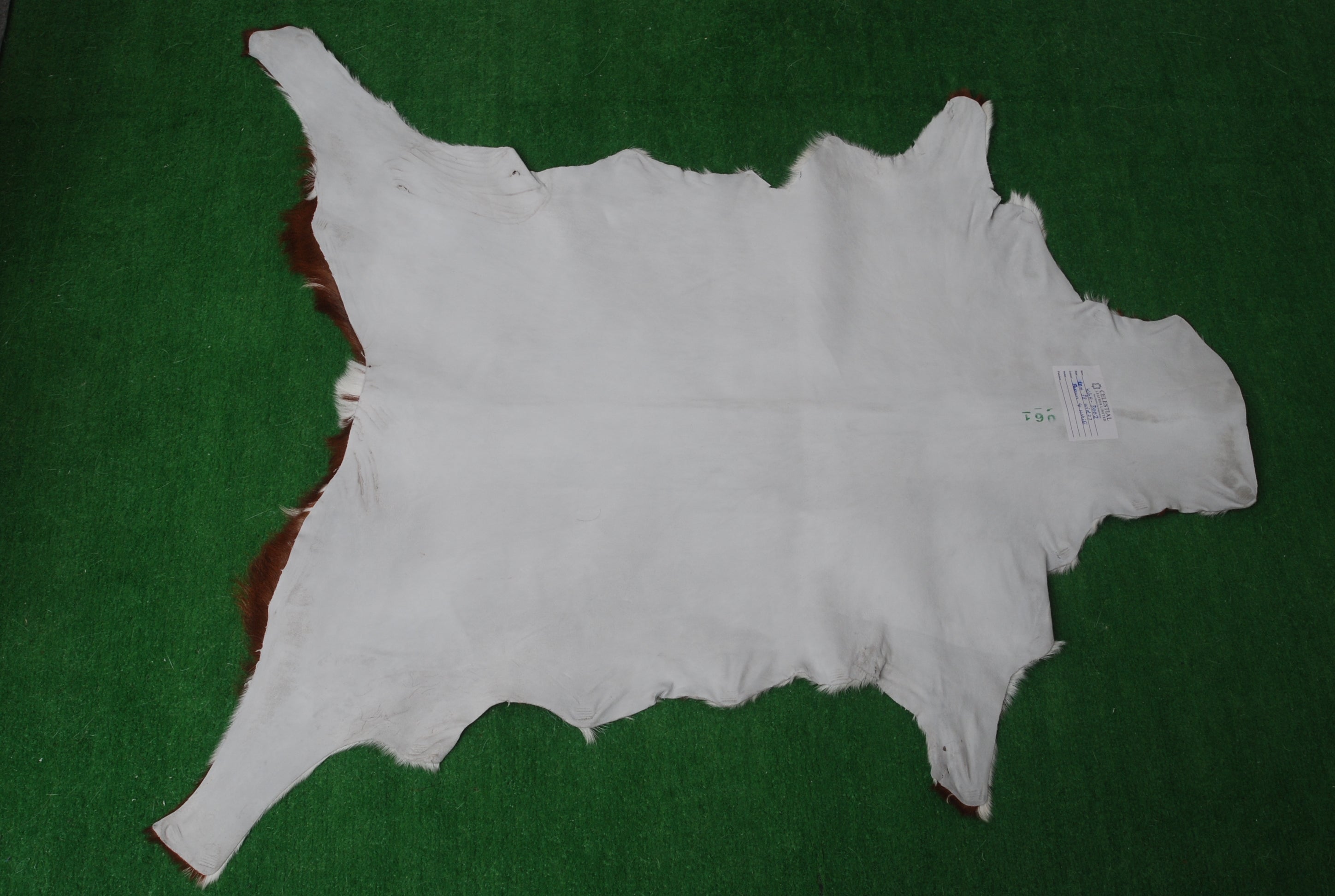 Handcrafted Dark Brown Goat Hide Rug - Soft, Natural Leather for Home Décor