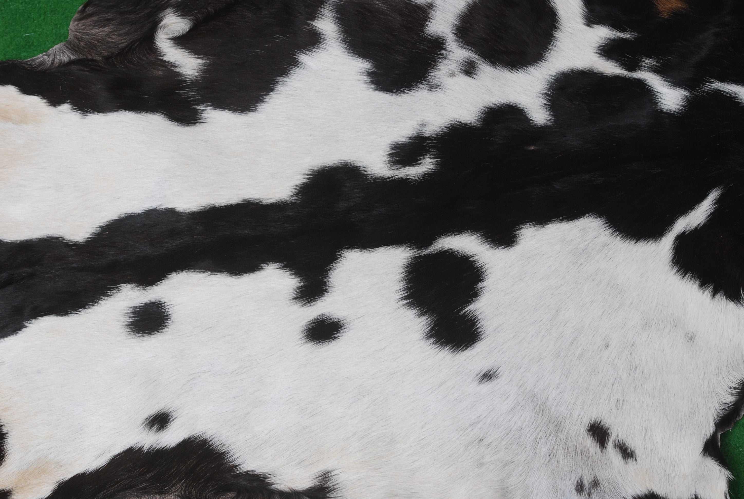 Black and White Handmade Goat Skin Rug – Natural Luxury for Your Home