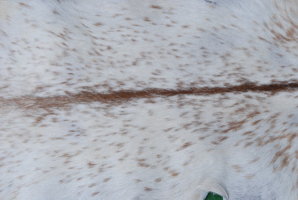 Handcrafted Brown and White Goat Skin Rug - Soft, Durable, and Elegant Décor - Celestial Leather Limited