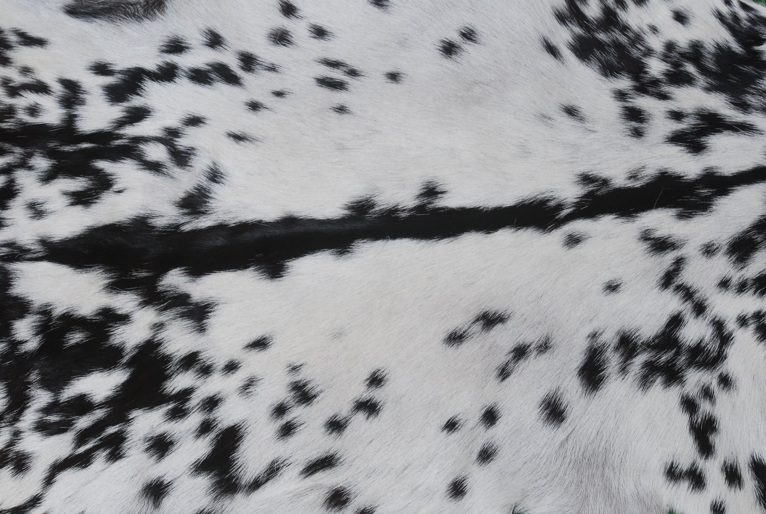 Black and White Handmade Goat Skin Rug – Natural Luxury for Your Home