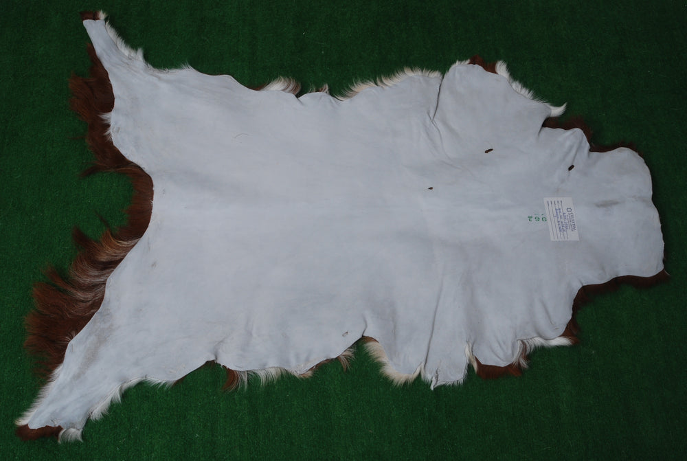 Luxury Brown & White Goat Hide Rug | Premium Hair-On Skin Rug for Home Decor - Celestial Leather Limited