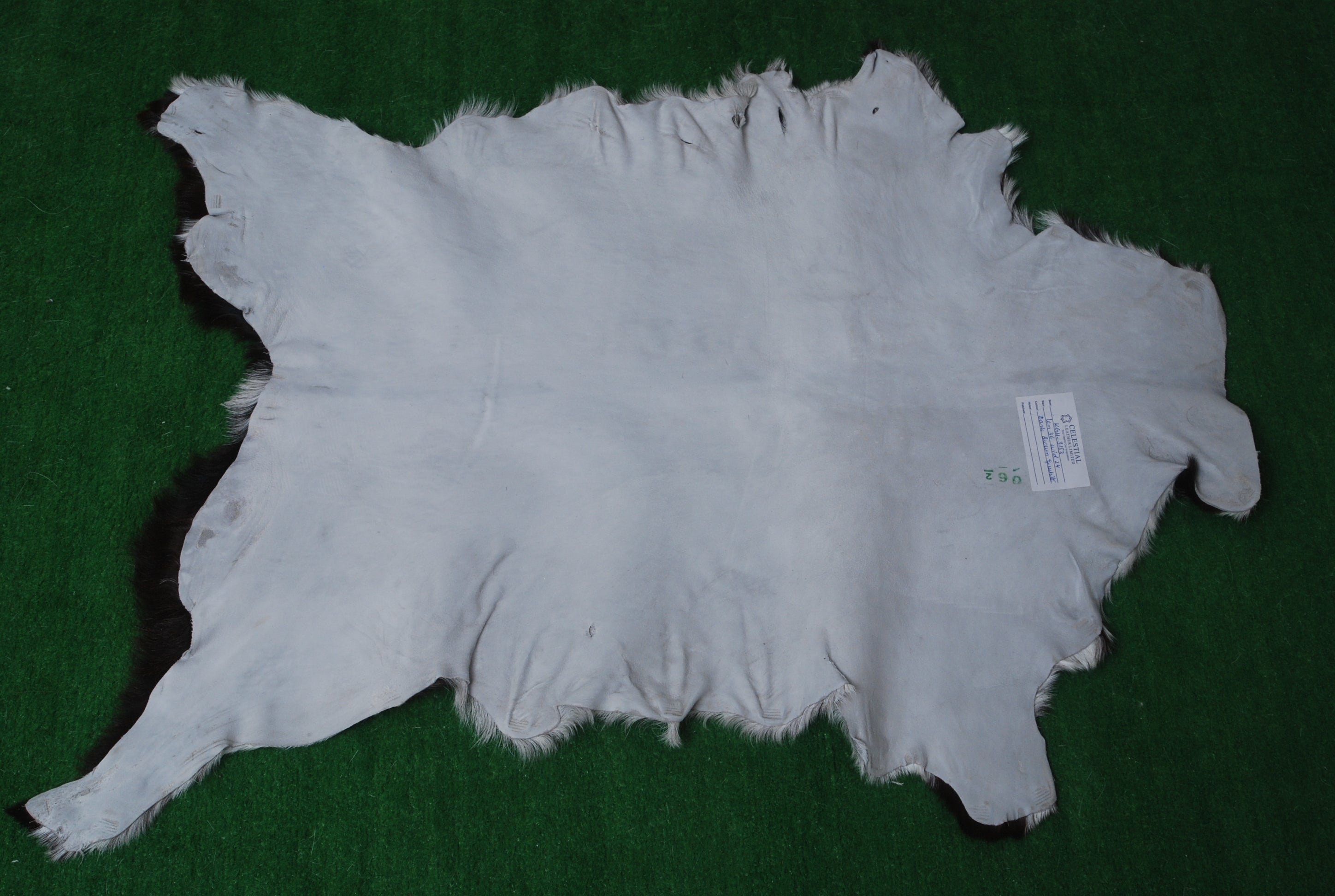 Elegant Black and White Goat Hide Rug - Perfect Accent for Any Room