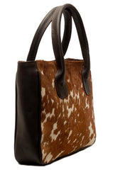 Handmade Brown and White Cowhide Shoulder Bag - Chic Leather Tote with Stylish Animal Print Design, Spacious and Versatile Daily Handbag