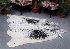 Luxurious Black & White Cowhide Rug | Hypoallergenic - Non-Slip Suede Back | Premium Quality - Unique Natural Beauty | Ideal for Bedroom - Celestial Leather Limited
