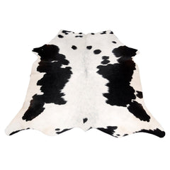 Luxurious Black and White Cowhide Rug - Hypoallergenic, Non-Slip, Handcrafted, Unique Beauty - Adds Sophistication to Any Room - Celestial Leather Limited