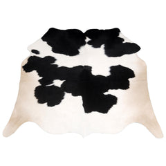 Luxurious Handcrafted Black and White Cowhide Rug - Hypoallergenic, Non-Slip Backing, Unique Markings - Durable and Versatile Home Decor - Celestial Leather Limited
