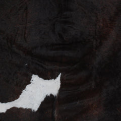 Luxuriously Handcrafted Dark Brown & White Cowhide Rug - Hypoallergenic, Durable, Unique Medium Area Rug for Rustic Charm - Celestial Leather Limited