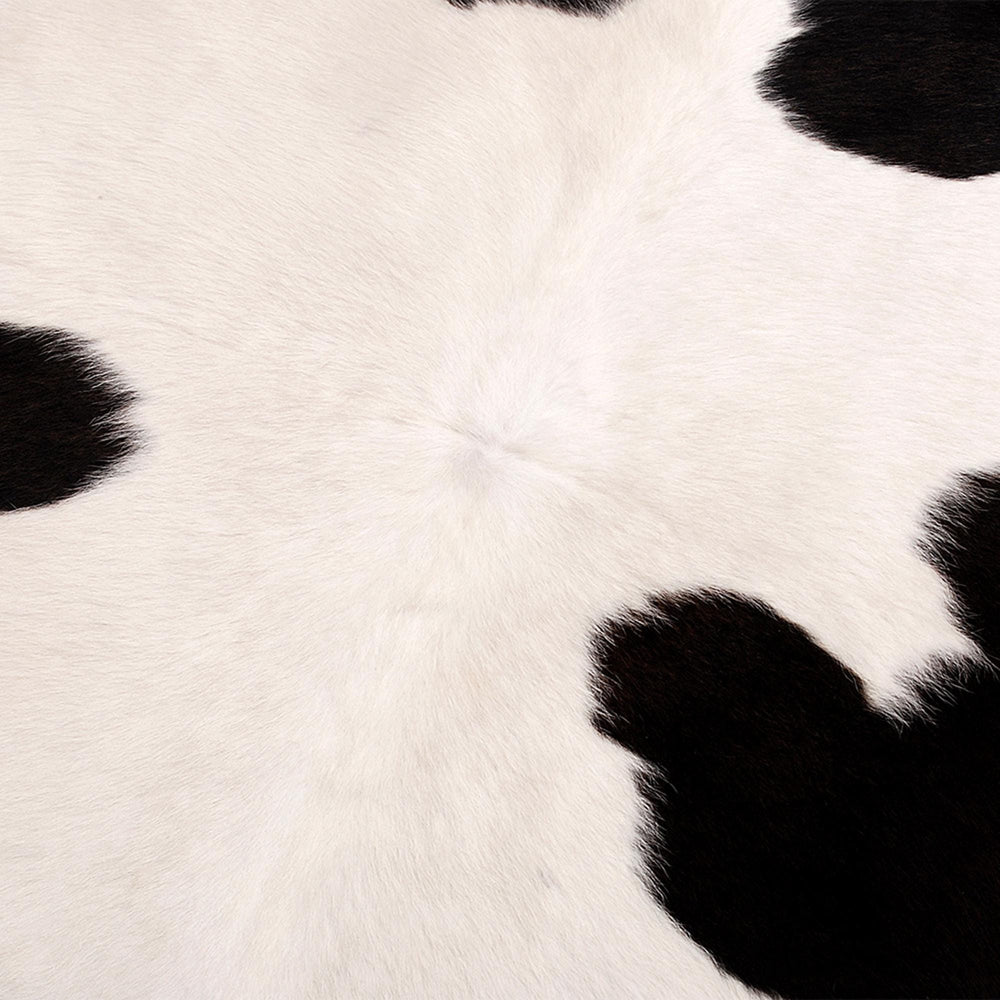 Luxurious Handcrafted Brown and White Cowhide Rug with Hypoallergenic Backing - Unique Beauty and Timeless Style for Living Room or Bedroom - Celestial Leather Limited