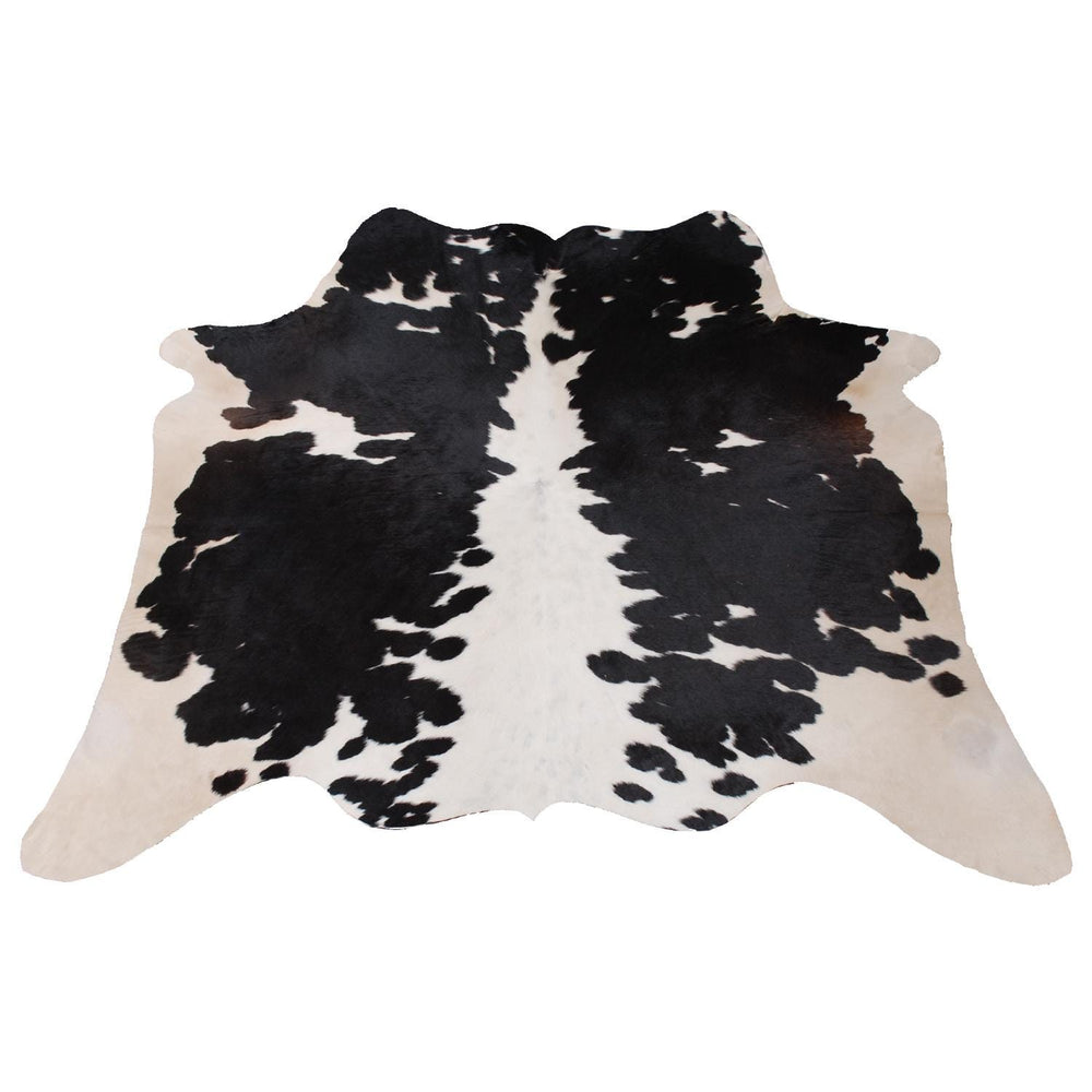 Luxurious Medium Black and White Cowhide Rug - Hypoallergenic, Handcrafted, and Durable for Modern Home Decor - Celestial Leather Limited