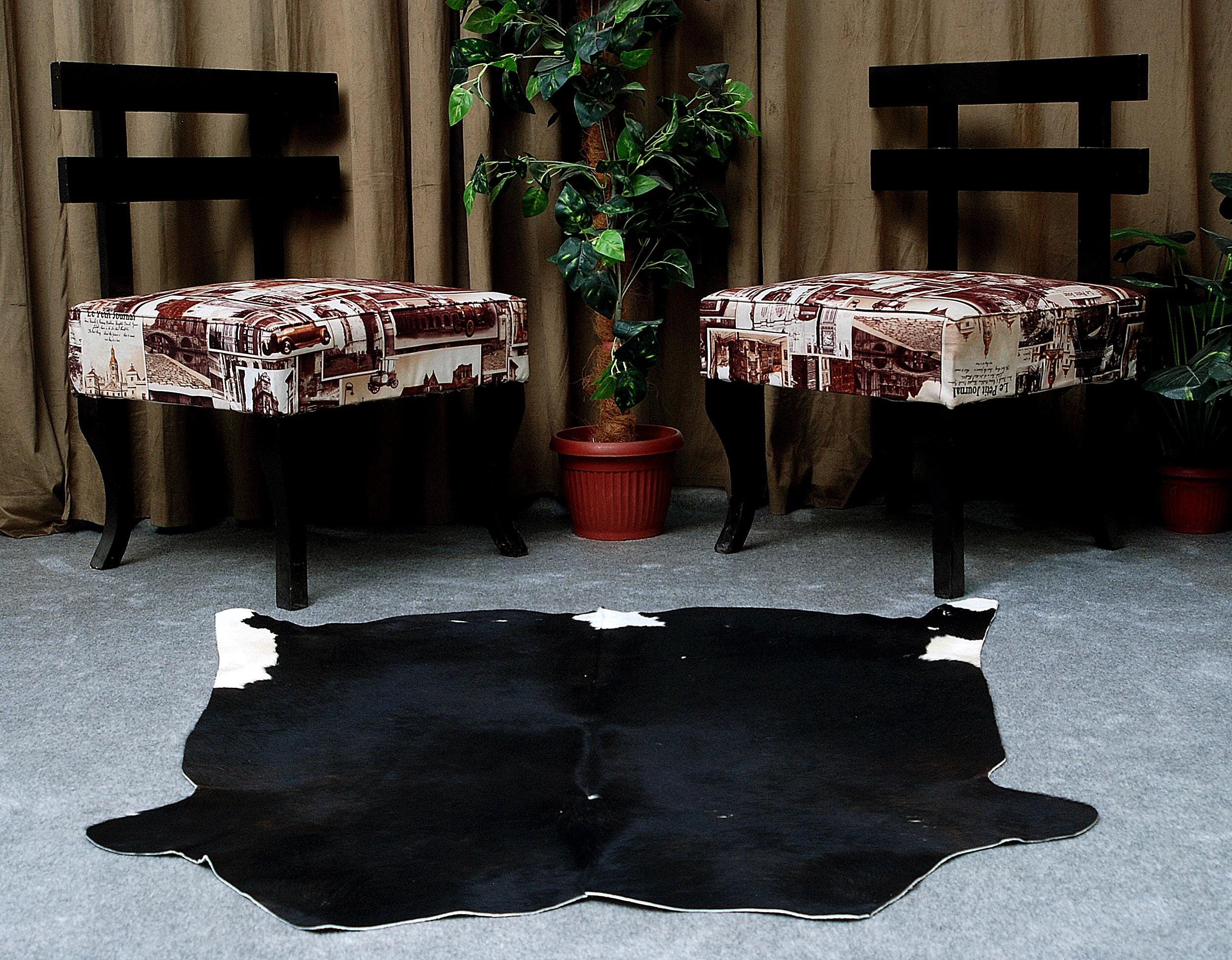 Luxurious Black and White Cowhide Rug - Hypoallergenic, Handcrafted, Unique Beauty - Medium Size for Home Decor - Celestial Leather Limited