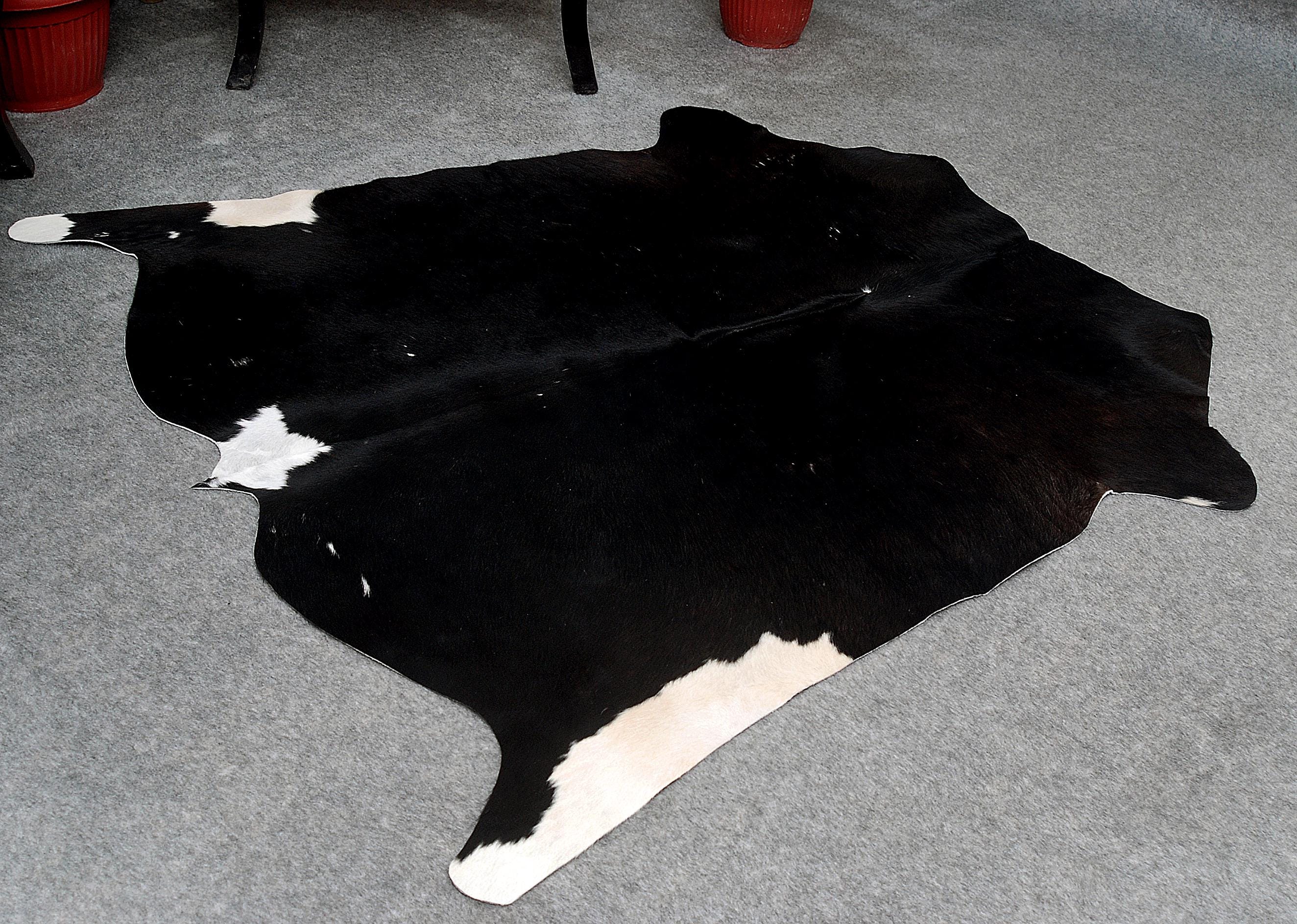 Luxurious Black and White Cowhide Rug - Hypoallergenic, Handcrafted, Unique Beauty - Medium Size for Home Decor - Celestial Leather Limited