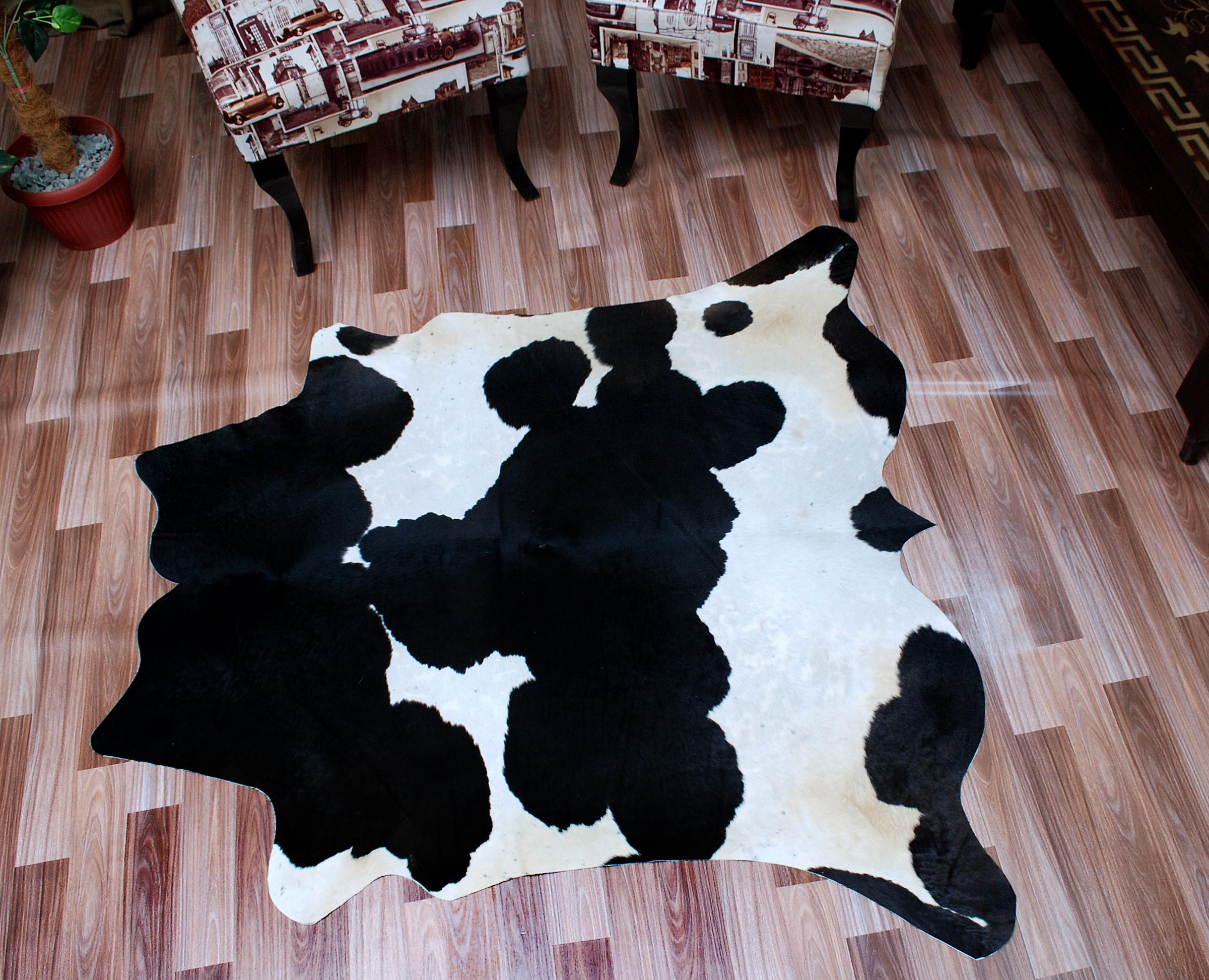 Luxurious Black & White Cowhide Rug | Handcrafted Medium Rug for Modern Home Décor | Hypoallergenic, Durable - Unique Beauty - Celestial Leather Limited