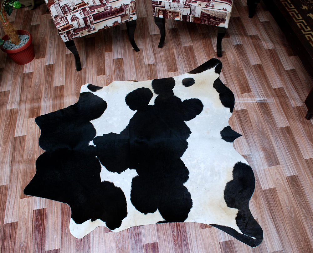 Luxurious Black & White Cowhide Rug | Handcrafted Medium Rug for Modern Home Décor | Hypoallergenic, Durable - Unique Beauty - Celestial Leather Limited